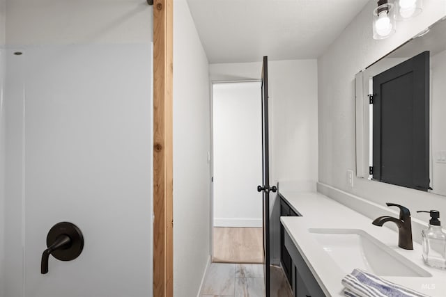905 E 2nd St, Emmett, ID 83617 - bathroom with vanity and marble finish flooring