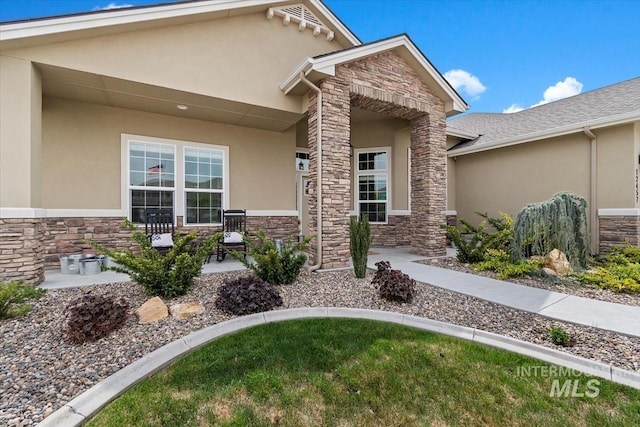 12457 W Superior St, Star, ID 83669 - property entrance with stucco siding and stone siding