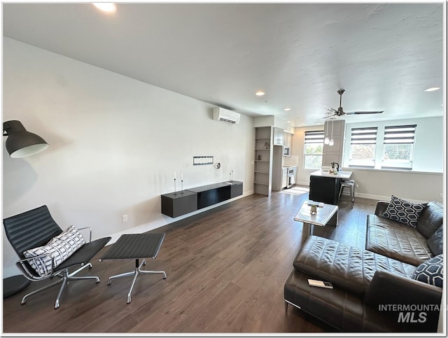 1514 W River St Unit 207, Boise, ID 83702 - living room featuring wood finished floors, baseboards, a wall mounted air conditioner, ceiling fan, and recessed lighting