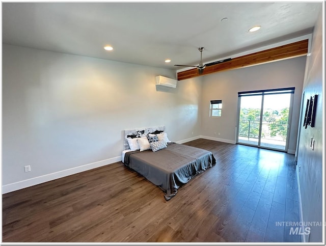 1514 W River St Unit 207, Boise, ID 83702 - bedroom with access to exterior, a wall unit AC, baseboards, dark wood-style floors, and recessed lighting