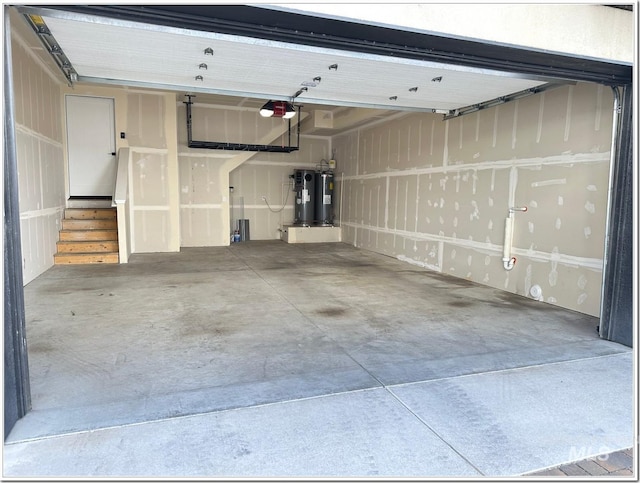 1514 W River St Unit 207, Boise, ID 83702 - garage with water heater and a garage door opener