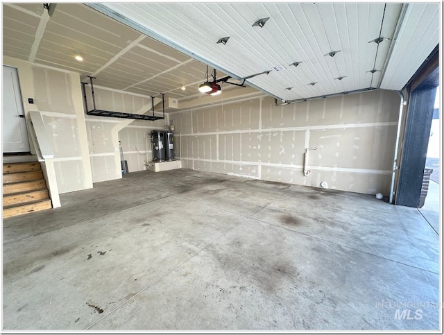 1514 W River St Unit 207, Boise, ID 83702 - garage with water heater and a garage door opener