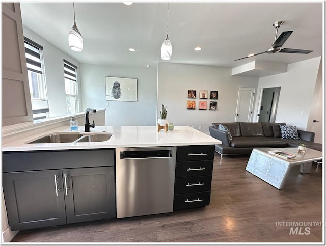 1514 W River St Unit 207, Boise, ID 83702 - kitchen with dishwasher, a sink, open floor plan, recessed lighting, and a peninsula