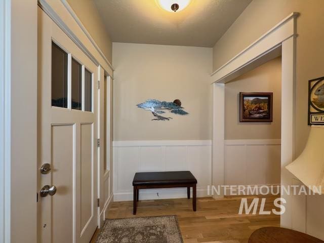 hallway featuring wood-type flooring