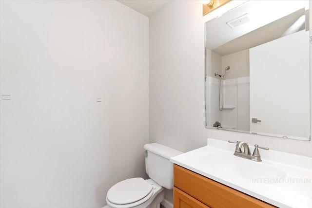 7267 Bowmont Rd, Nampa, ID 83686 - bathroom featuring toilet and vanity