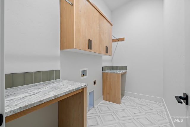 laundry room with cabinet space, baseboards, washer hookup, and hookup for an electric dryer