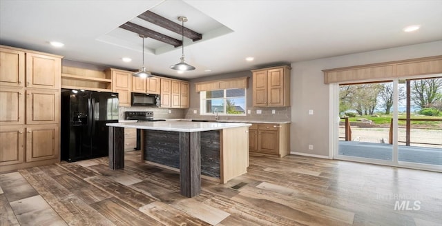 kitchen featuring black appliances, open shelves, wood finished floors, light countertops, and backsplash