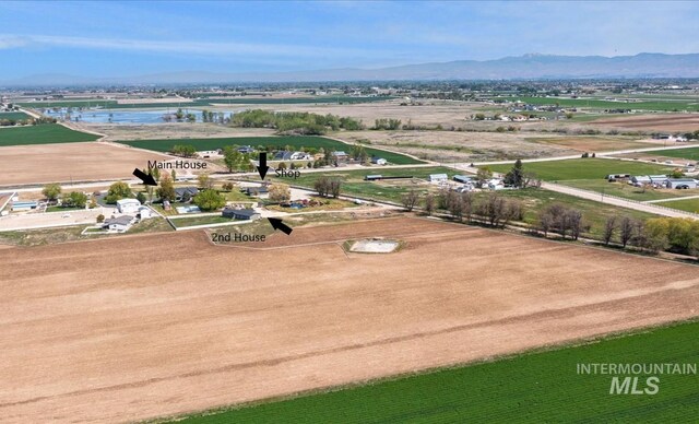 bird's eye view of a water and mountain view