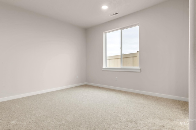 view of carpeted spare room