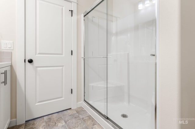 bathroom featuring walk in shower