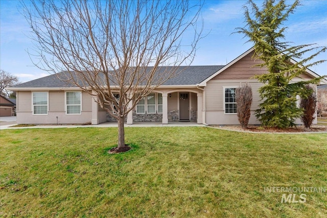 ranch-style house with stone siding and a front lawn