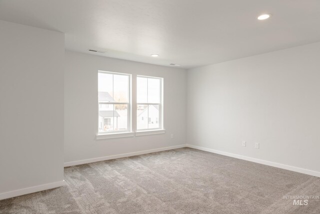 view of carpeted spare room