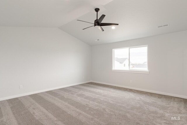 empty room featuring light colored carpet