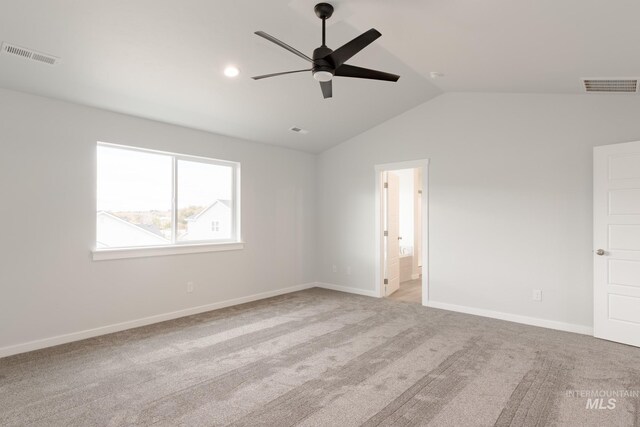 unfurnished bedroom featuring multiple windows, light carpet, and a closet