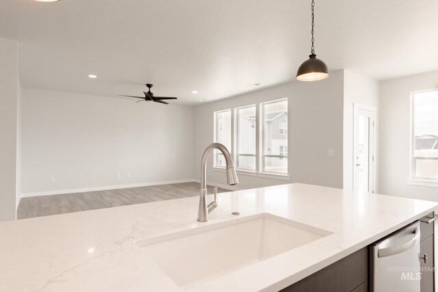 unfurnished dining area featuring a chandelier and light hardwood / wood-style floors