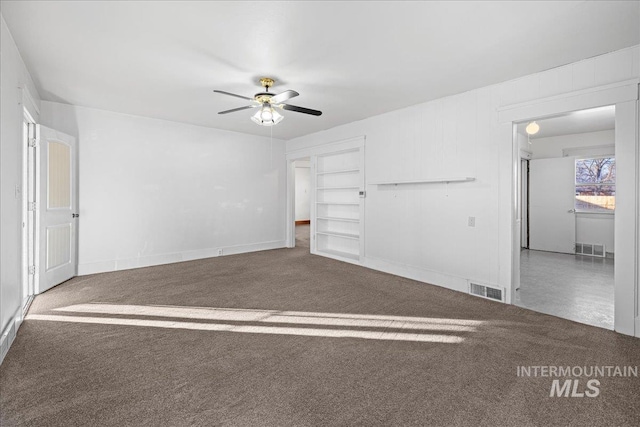 unfurnished living room with carpet floors and ceiling fan