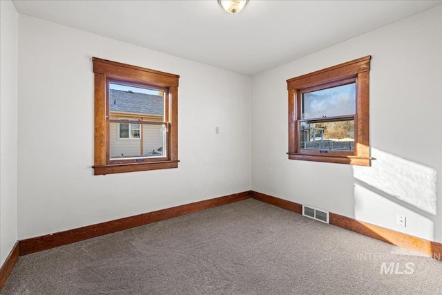 empty room featuring carpet