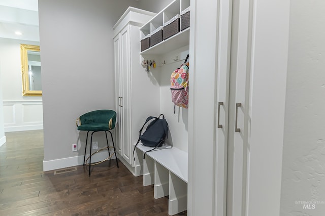 mudroom with visible vents and wood finished floors