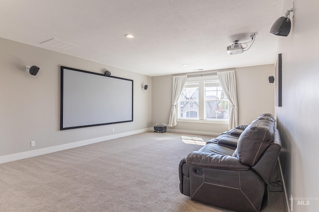 carpeted cinema room featuring baseboards and recessed lighting