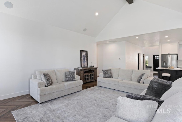 living area featuring beam ceiling, high vaulted ceiling, baseboards, and recessed lighting