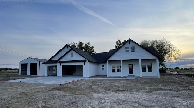 4695 County Line Rd, New Plymouth, ID 83655 - view of front facade featuring an attached garage, driveway, and covered porch