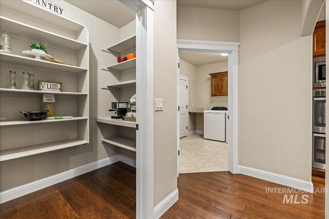 pantry featuring washer / dryer