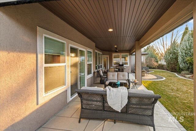 view of patio / terrace featuring area for grilling and outdoor lounge area