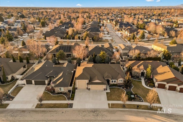 birds eye view of property with a residential view