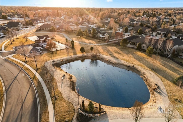 aerial view featuring a residential view and a water view