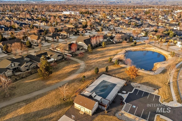 aerial view featuring a mountain view and a residential view