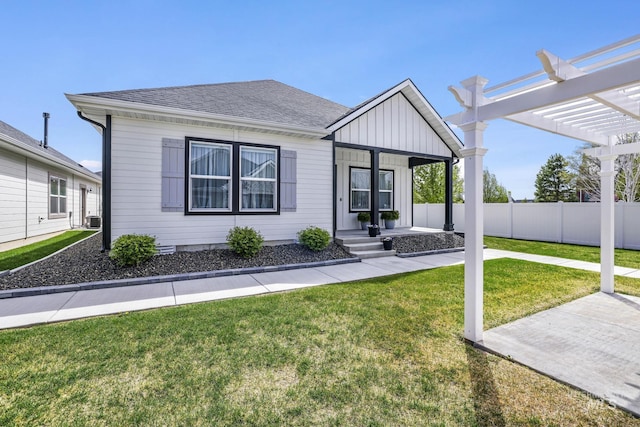 view of front of property featuring a porch, a pergola, a front lawn, board and batten siding, and a shingled roof
