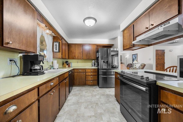 kitchen featuring stainless steel refrigerator with ice dispenser, black dishwasher, electric stove, and sink