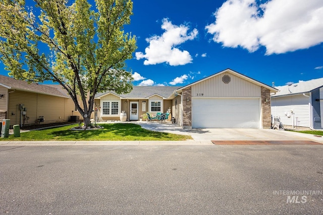 319 N Westminster St, Nampa, ID 83651 - single story home with an attached garage, driveway, brick siding, and a front yard