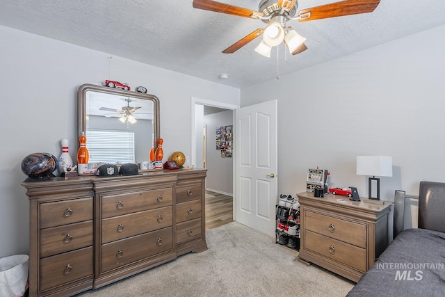 319 N Westminster St, Nampa, ID 83651 - bedroom featuring a textured ceiling, light carpet, and ceiling fan