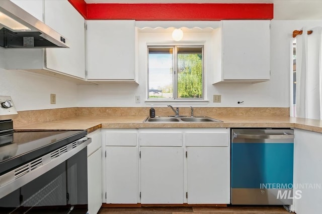 1919 S Banner St, Nampa, ID 83686 - kitchen with stainless steel range with electric stovetop, dishwashing machine, range hood, a sink, and light countertops