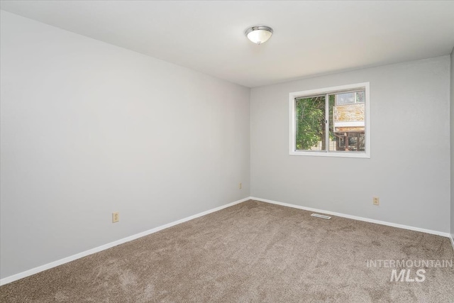 1919 S Banner St, Nampa, ID 83686 - carpeted empty room featuring baseboards