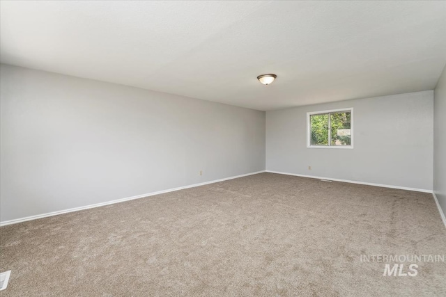 1919 S Banner St, Nampa, ID 83686 - unfurnished room featuring baseboards and carpet floors