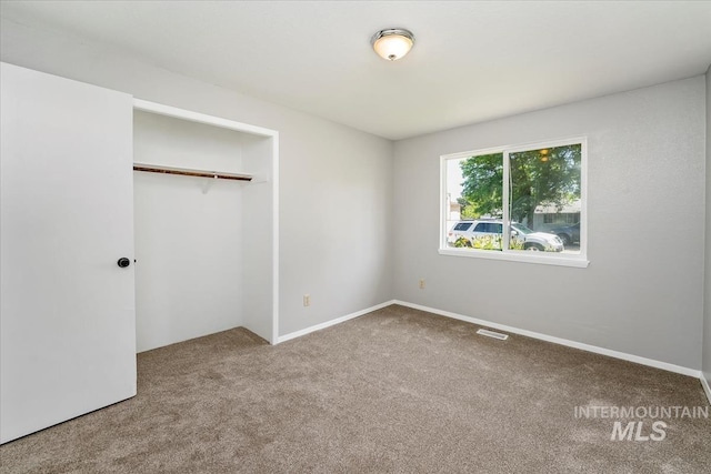 1919 S Banner St, Nampa, ID 83686 - unfurnished bedroom featuring carpet floors, a closet, and baseboards