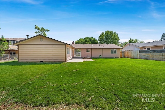 1919 S Banner St, Nampa, ID 83686 - rear view of property featuring a patio area, crawl space, and a chimney