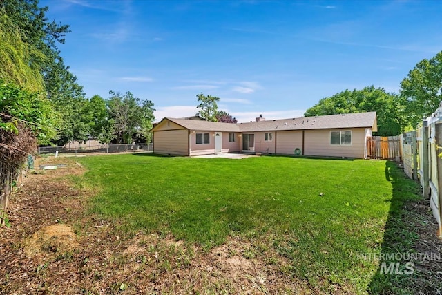 1919 S Banner St, Nampa, ID 83686 - rear view of house with a patio area
