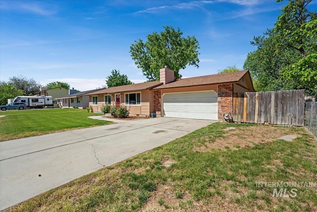 1919 S Banner St, Nampa, ID 83686 - single story home with brick siding, an attached garage, driveway, and a chimney
