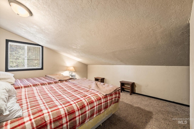 carpeted bedroom featuring baseboards, a textured ceiling, and lofted ceiling