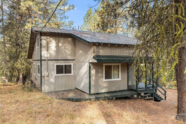 exterior space with metal roof