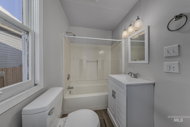 36 W Liberty, Weiser, ID 83672 - bathroom with bathing tub / shower combination, vanity, and wood finished floors