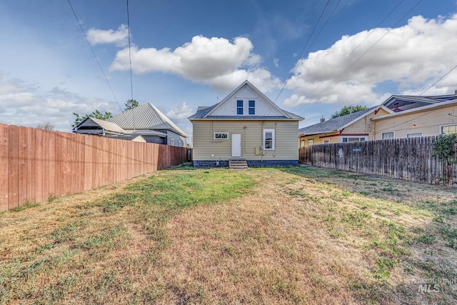 36 W Liberty, Weiser, ID 83672 - back of house featuring entry steps and a fenced backyard