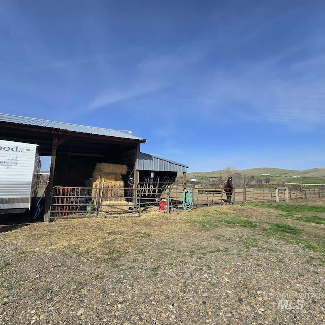 1280 Monroe Creek Rd, Weiser, ID 83672 - view of outdoor structure featuring an exterior structure and a rural view