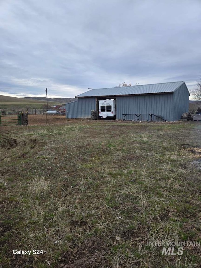 1280 Monroe Creek Rd, Weiser, ID 83672 - view of yard with a pole building and an outdoor structure