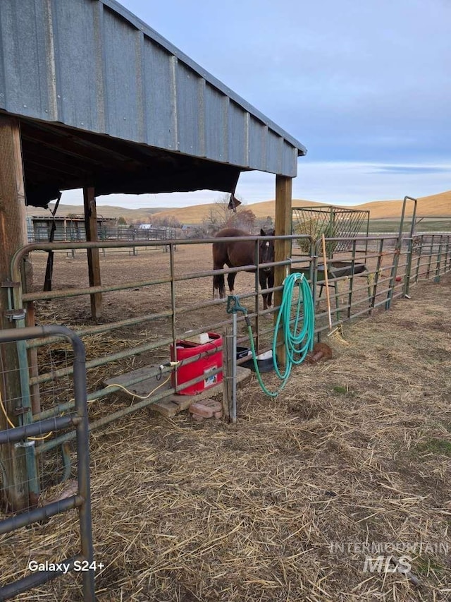 1280 Monroe Creek Rd, Weiser, ID 83672 - view of jungle gym with a view of countryside, an exterior structure, and an outbuilding