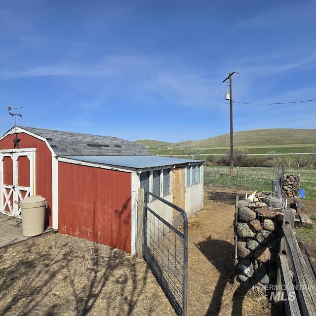 1280 Monroe Creek Rd, Weiser, ID 83672 - view of outdoor structure featuring a view of rural / pastoral area and a fire pit
