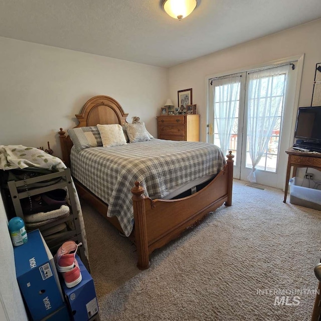 1280 Monroe Creek Rd, Weiser, ID 83672 - carpeted bedroom featuring access to outside